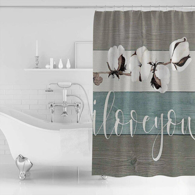 Dusjforheng med bomullsblomster og tekst