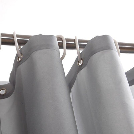 Grått dusjforheng i stoff