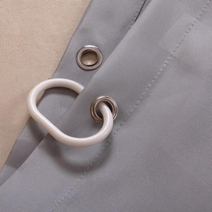 Grått dusjforheng i stoff